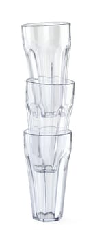 Stack of three empty hexagonal glass cups on a white background