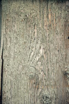 A highly detailed close-up of a weathered wooden surface with peeling paint and natural wood grain texture. Ideal for backgrounds, vintage aesthetics, and rustic design elements