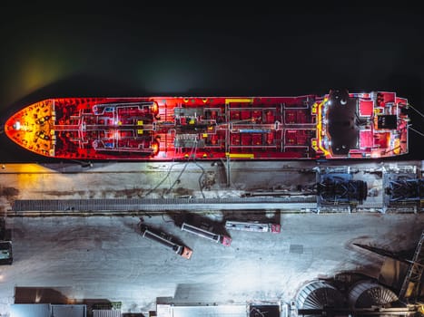 Aerial View of Port Tanker and Grain Silos. High oleic sunflower oil is loaded from tanker trucks onto a tanker.