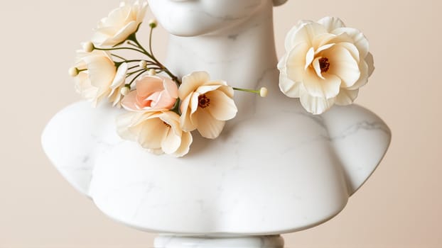 Stone statue covered with spring flowers on isolated background. High quality photo