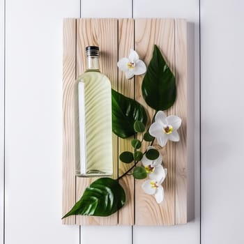 Glass bottle of eco-friendly natural body oils. High quality photo