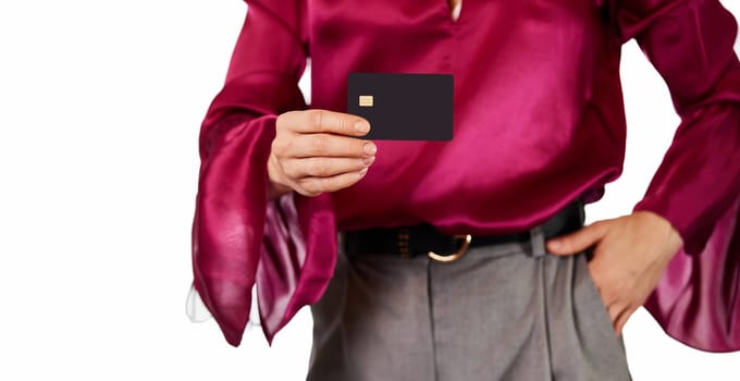 female hand holding black premium credit bank card on white background. cashless lifestyle