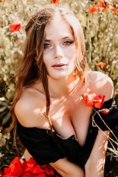 Woman poppies field. portrait of a happy woman with long hair in a poppy field and enjoying the beauty of nature in a warm summer day