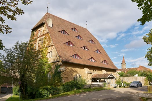 Rothenburg ob der Tauber, Germany – September 24, 2024: The former Rossmuhle, Horsemill now a popular youth hostel in the old town of Rothenburg ob der Tauber in Germany
