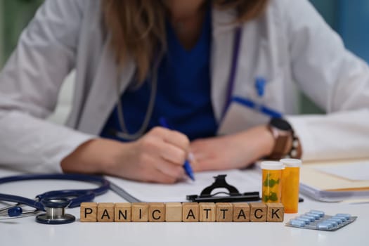 A doctor records observations on panic attacks, emphasizing the significance of mental health awareness and education