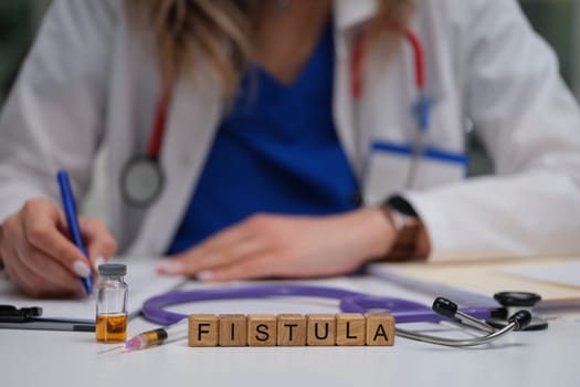 A healthcare professional specializing in fistula treatment, equipped with necessary tools and documentation