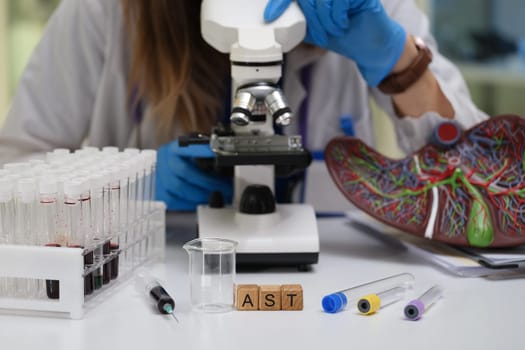 In a contemporary laboratory environment, we are meticulously analyzing various samples under a microscope