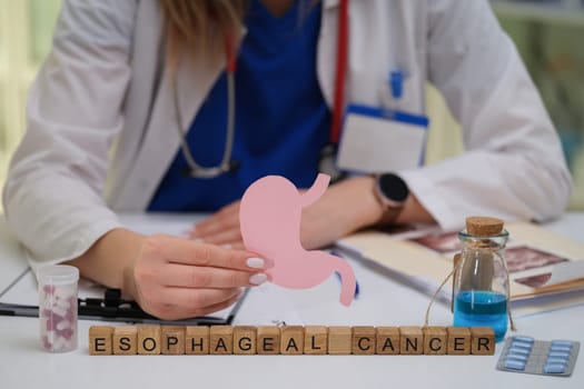 A dedicated healthcare professional actively raises awareness about esophageal cancer using various educational tools