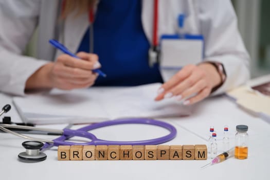 A dedicated healthcare professional meticulously studies various paperwork with a specific focus on bronchospasm