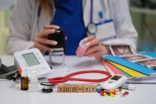 A healthcare worker is using medical instruments to conduct a thorough assessment of the patients health