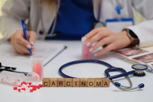 A medical professional is documenting and analyzing carcinoma research using advanced lab tools and equipment