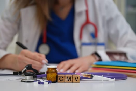 A dedicated medical professional meticulously writing, surrounded by essential healthcare tools and a CMV label