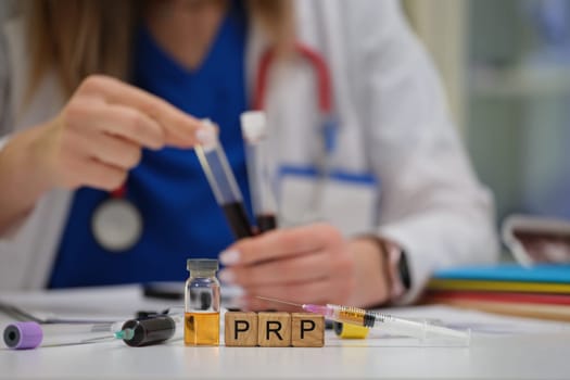 A healthcare practitioner prepares PRP samples for treatment, showcasing advanced medical techniques.