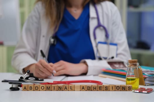 A medical professional studies abdominal adhesions, highlighting their importance in effective healthcare