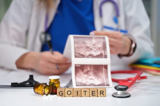 A medical professional is conducting a thorough review of imaging data pertaining to goiter and thyroid health