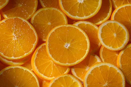 Juicy orange slices are perfectly displayed, showcasing their vibrant color and inviting aroma for all to enjoy.