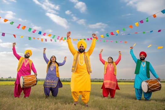 A vibrant Baisakhi celebration with people dancing in traditional attire, holding colorful flags and playing drums.