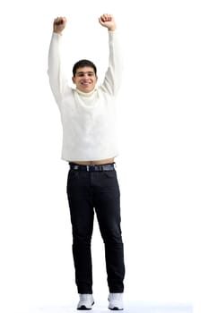 A man, full-length, on a white background, raised his hands up.