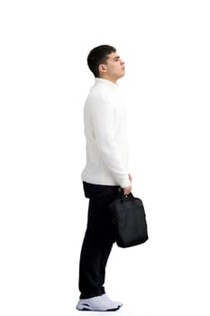 A man, full-length, on a white background, with a briefcase.