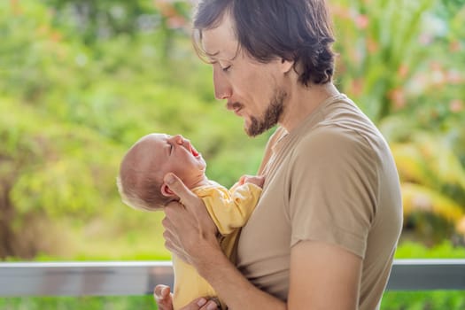 A father gently embraces his newborn baby near a window, bathed in soft natural light. A heartwarming moment of love, protection, and deep connection, symbolizing the beauty of fatherhood and new beginnings.