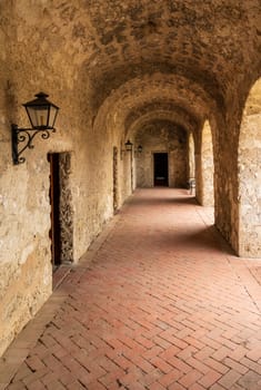 Repeating patterns of the roof supporting arches in Mission Concepcion church near San Antonio, Texas