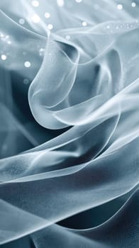 Gentle folds of translucent fabric cascade gracefully, catching soft light and reflecting delicate sparkles. The scene evokes a calm and dreamy ambiance, suggesting elegance and fluidity.