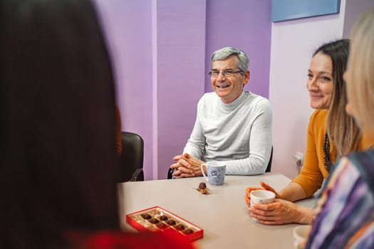 Teachers meeting at language learning school.
