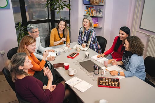 Teachers meeting at language learning school.
