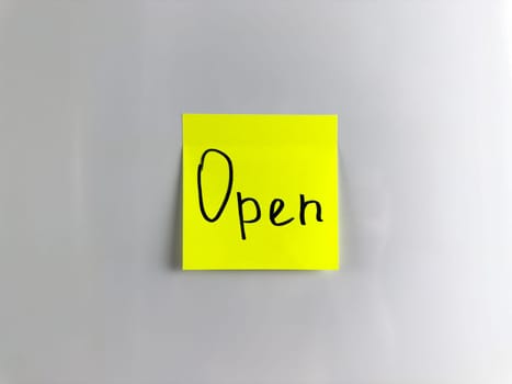 Sticker with marker inscription says open. Its open, come on in. Bright sticker with inscription for opening project. The sign open on white background