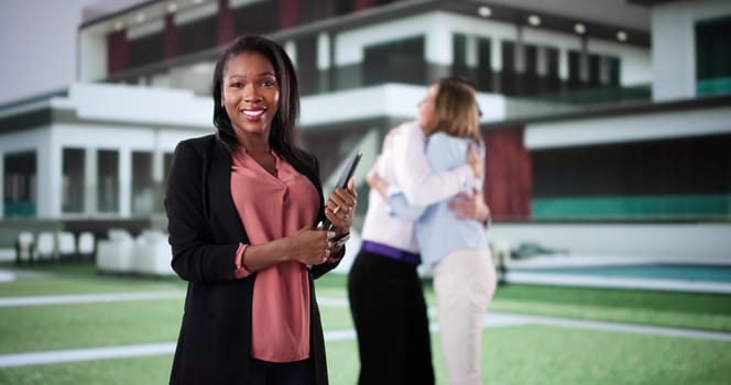Real Estate Agent seals deal with diverse couple in new home
