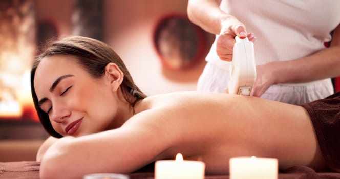 Female Beautician Providing Laser Hair Removal Treatment in Salon Space