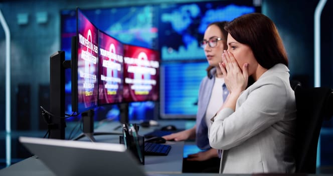 Professional cybersecurity analyst preventing ransomware cyber attack using advanced malware.