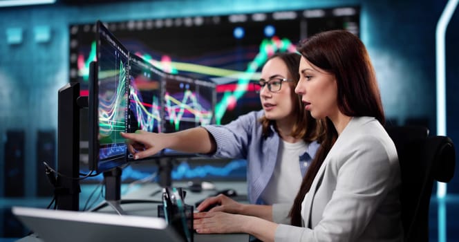 Stock Trader Analyzing Market Trends on Computer Screen in Office