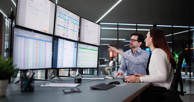Corporate Accountant Analyzing Tax Invoices on Desktop Computer Screen