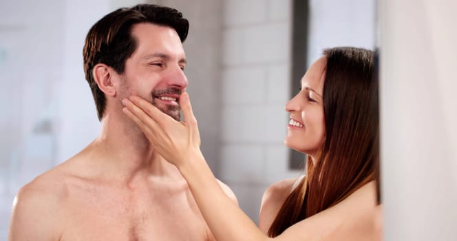Skincare in the Bathroom: Young Couple Applying Cream Together