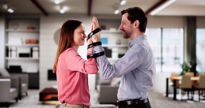 Family Lawyer Holding Couple's Tie in Codependent Relationship Portrait