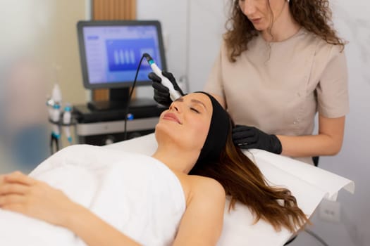 A skilled therapist performs a skin treatment that rejuvenates and hydrates while removing impurities, leaving the client refreshed and relaxed in a tranquil spa atmosphere.