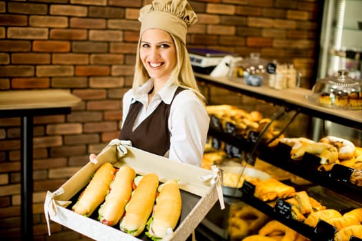Young woman working in a bakery