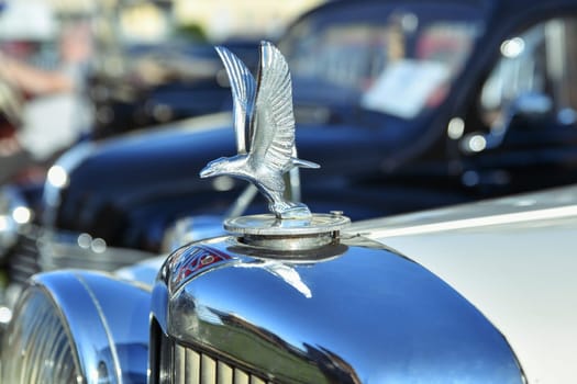 DIEPPE, FRANCE - SEPTEMBER 01, 2018: Eagle ornament of the Alvis car company. Very rare car