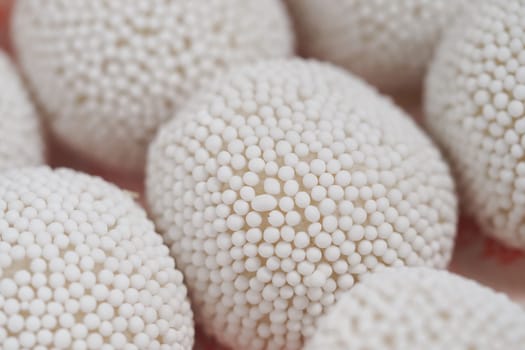 Close-up of small spherical objects showcasing intricate designs and texture.