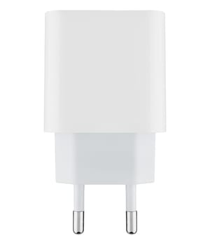 White mains power adapter on white background. Compatible with most mobile devices and gadgets.