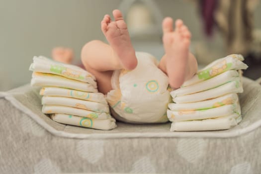 One-month-old baby lying next to a stack of diapers. How to choose the best diapers for your newborn. Baby care, diaper selection, and parenting essentials concept.