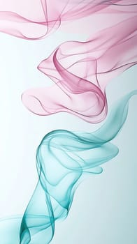 Delicate wisps of pink and turquoise fabric intertwine gracefully against a soft background, showcasing an elegant dance of colors and movement.