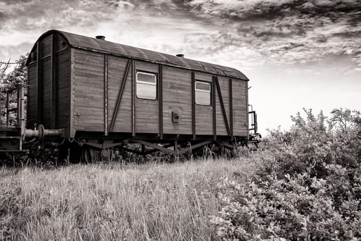 discarded railway wagon on a disused abandoned railway line