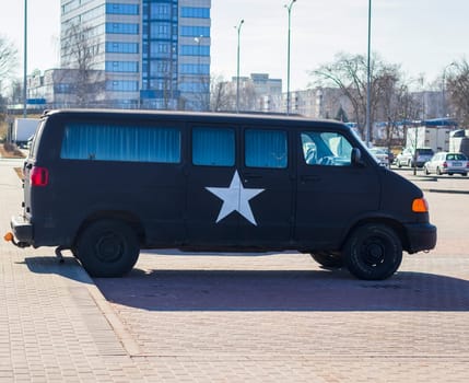 Military range vehicle with white star painted on the side of it