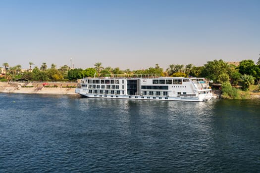 Luxor, Egypt - 2 November 2024: Viking River Cruises ship Sobek is docked along the shore of the Nile River