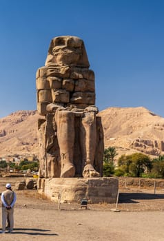 The Colossi of Memnon are two massive stone statues of the Pharaoh Amenhotep III, located on the West Bank of Luxor, Egypt.