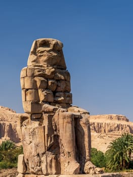 The Colossi of Memnon are two massive stone statues of the Pharaoh Amenhotep III, located on the West Bank of Luxor, Egypt.