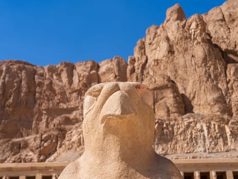 Large statue of Falcon god Horus at Hatshepsut Temple near Luxor Egypt by the columns of the Mortuary