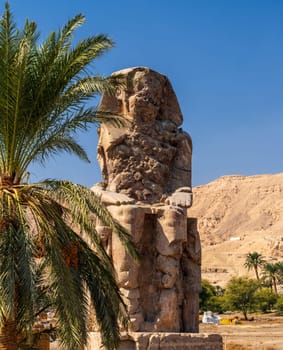 The Colossi of Memnon are two massive stone statues of the Pharaoh Amenhotep III, located on the West Bank of Luxor, Egypt.